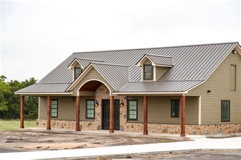 house with metal roof color light stone|stone houses with metal roof.